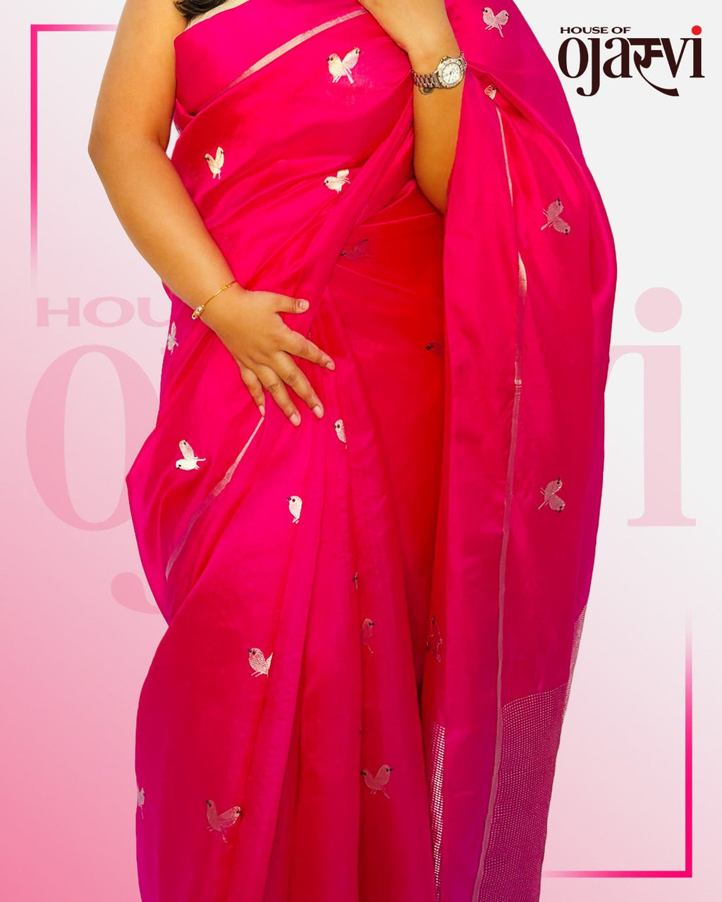 Model showcasing the vibrant pink Chanderi saree with scattered silver zari butterfly motifs and sleek silver border.