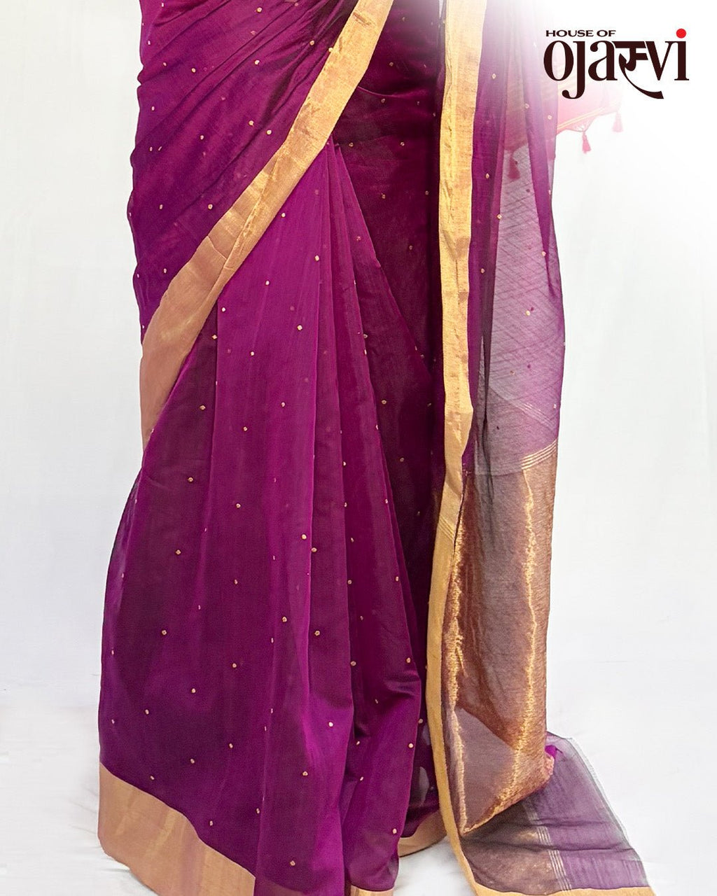 Close-up of the sheer purple Chanderi fabric showing the delicate golden butis and rich golden zari pallu drape.