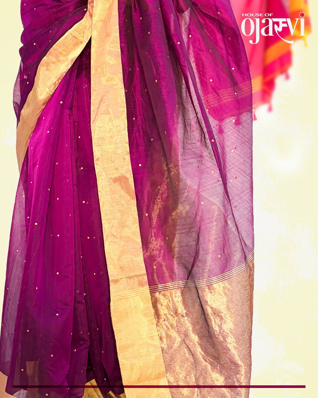 Detailed view of the broad golden zari border and the rich texture of the purple handwoven Chanderi saree.